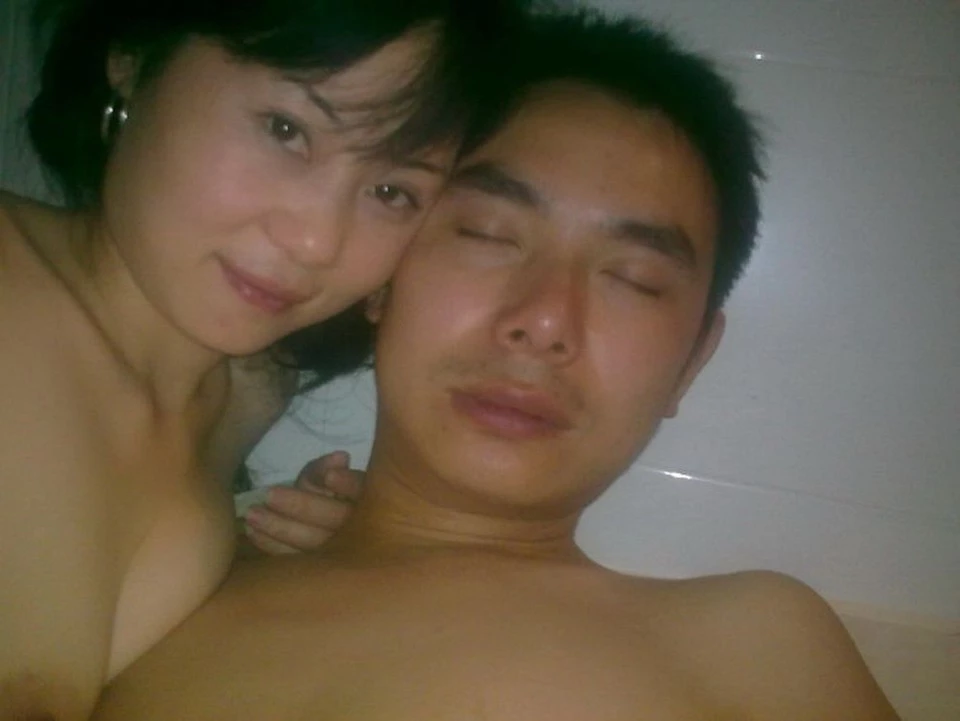 十分迷人的少妇 [18P]